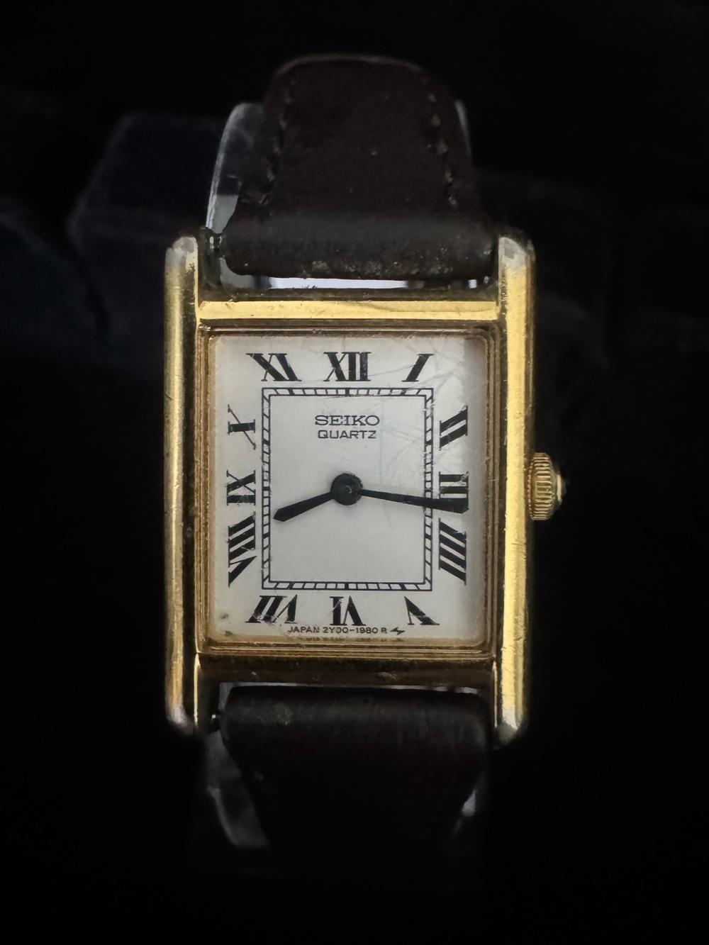 Seiko Gold Tone Rectangular Watch with White Dial and Brown Strap woman’s watch